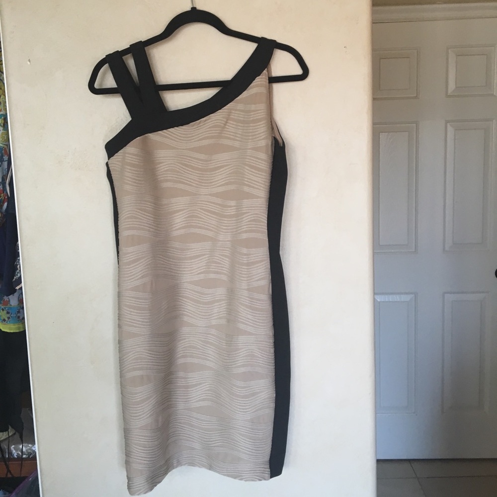 Tan body con dress with black sides